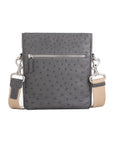 Anthracite ostrich leather crossbody bag with zipper and strap on a white background