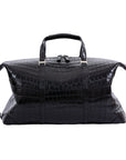 Large black crocodile bag with straps on a white background