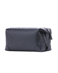 Navy ostrich textured pouch on a white background