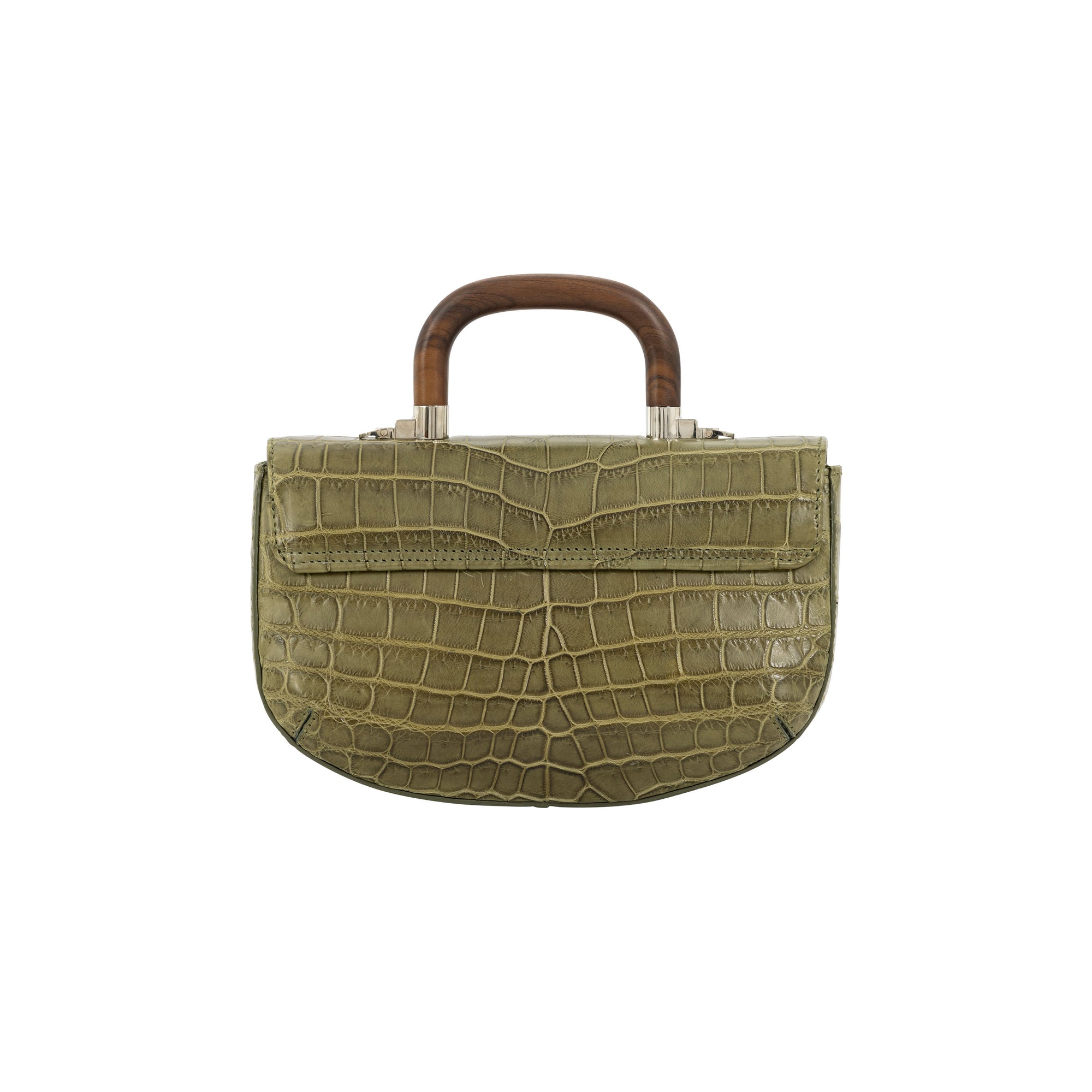 Back of a forest green crocodile handbag with a wooden handle on a white background