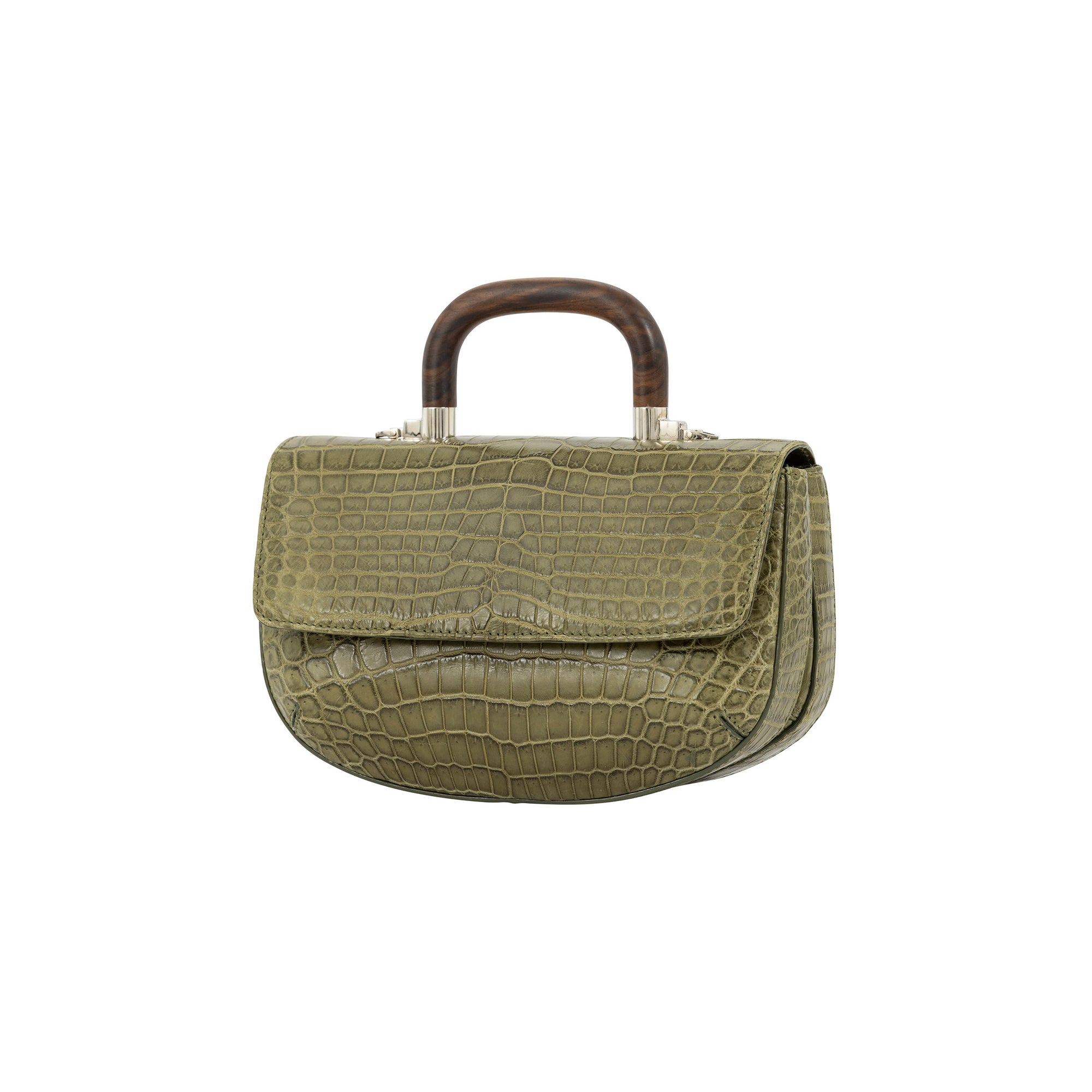 Side of a forest green crocodile handbag with a wooden handle on a white background