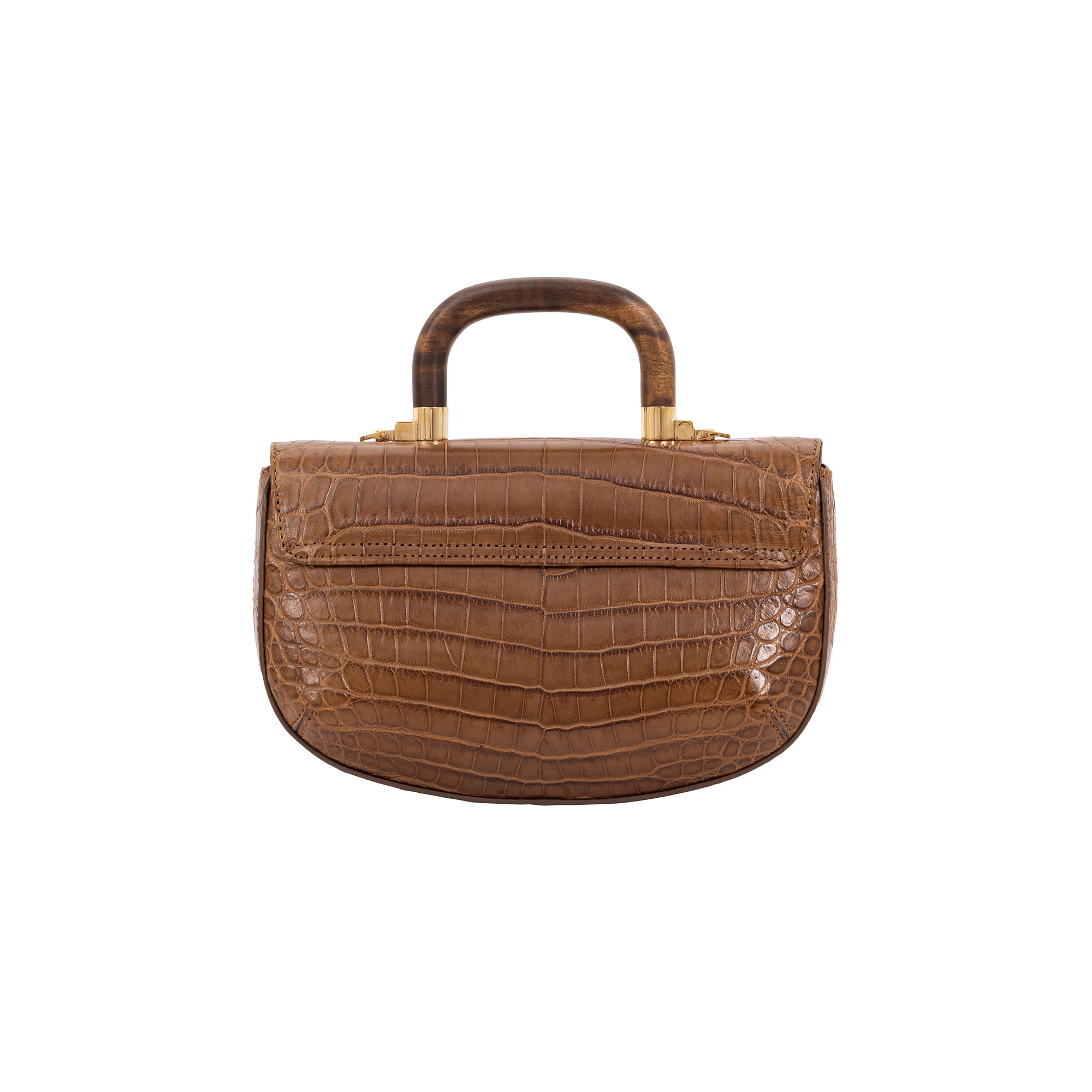 Back of brown crocodile handbag with a wooden handle on a white background