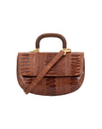 Front of cognac handbag with a wooden handle with strap on a white background
