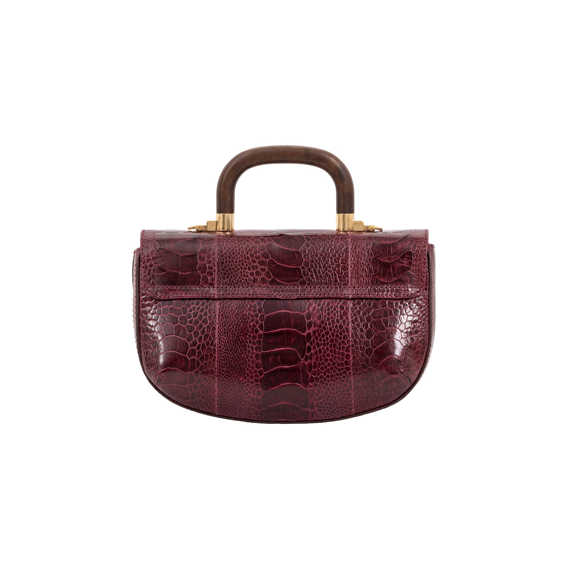 Back of maroon handbag with a wooden handle on a white background