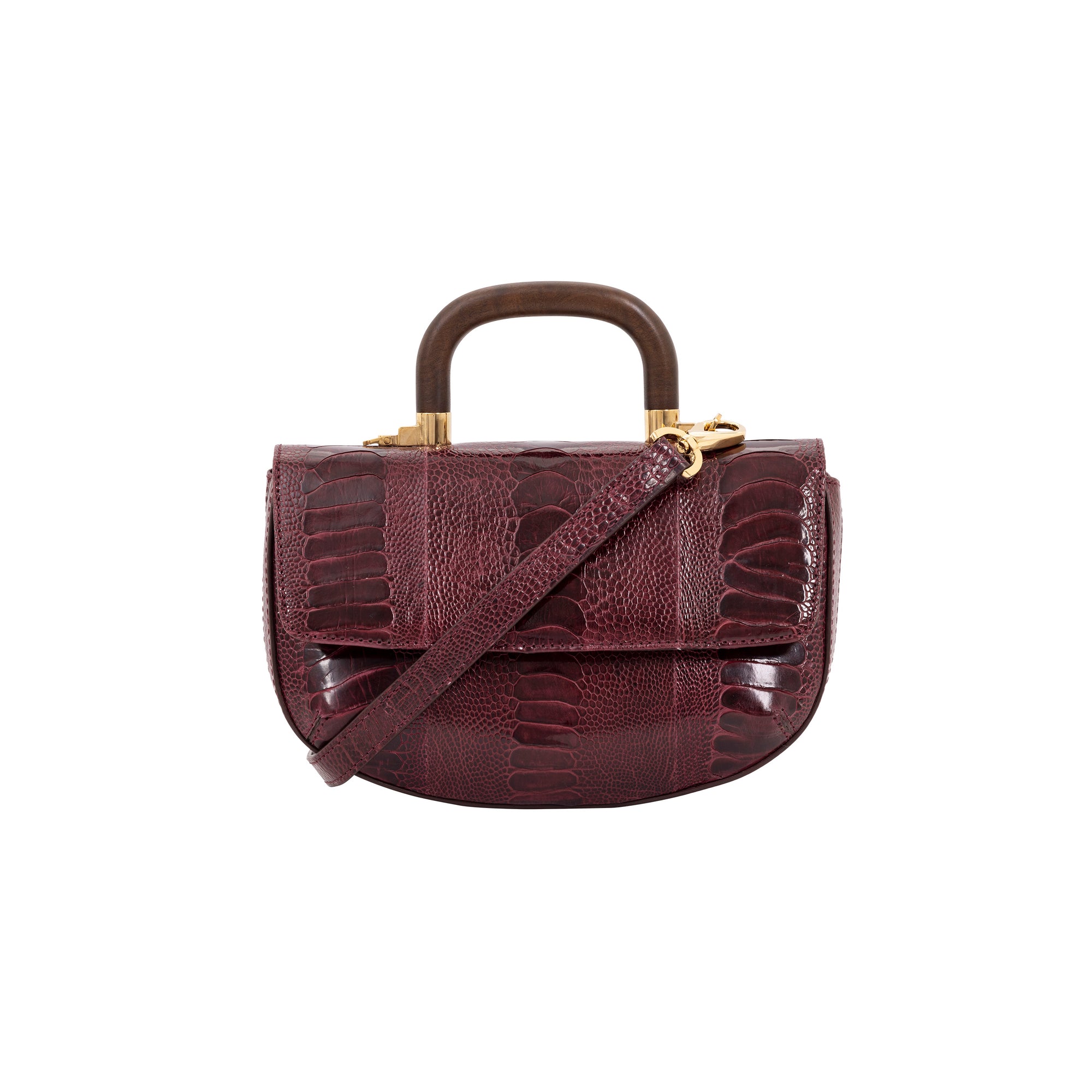 Fron of maroon handbag with a wooden handle and strap on a white background