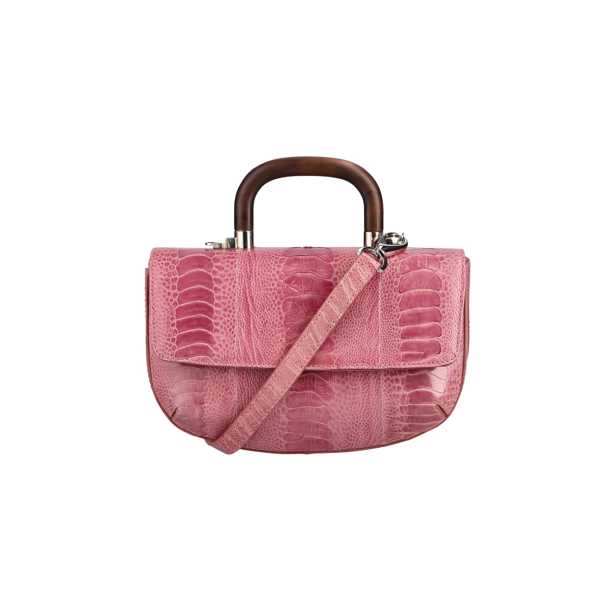 Front of a pink textured handbag with a strap and wooden handle on a white background