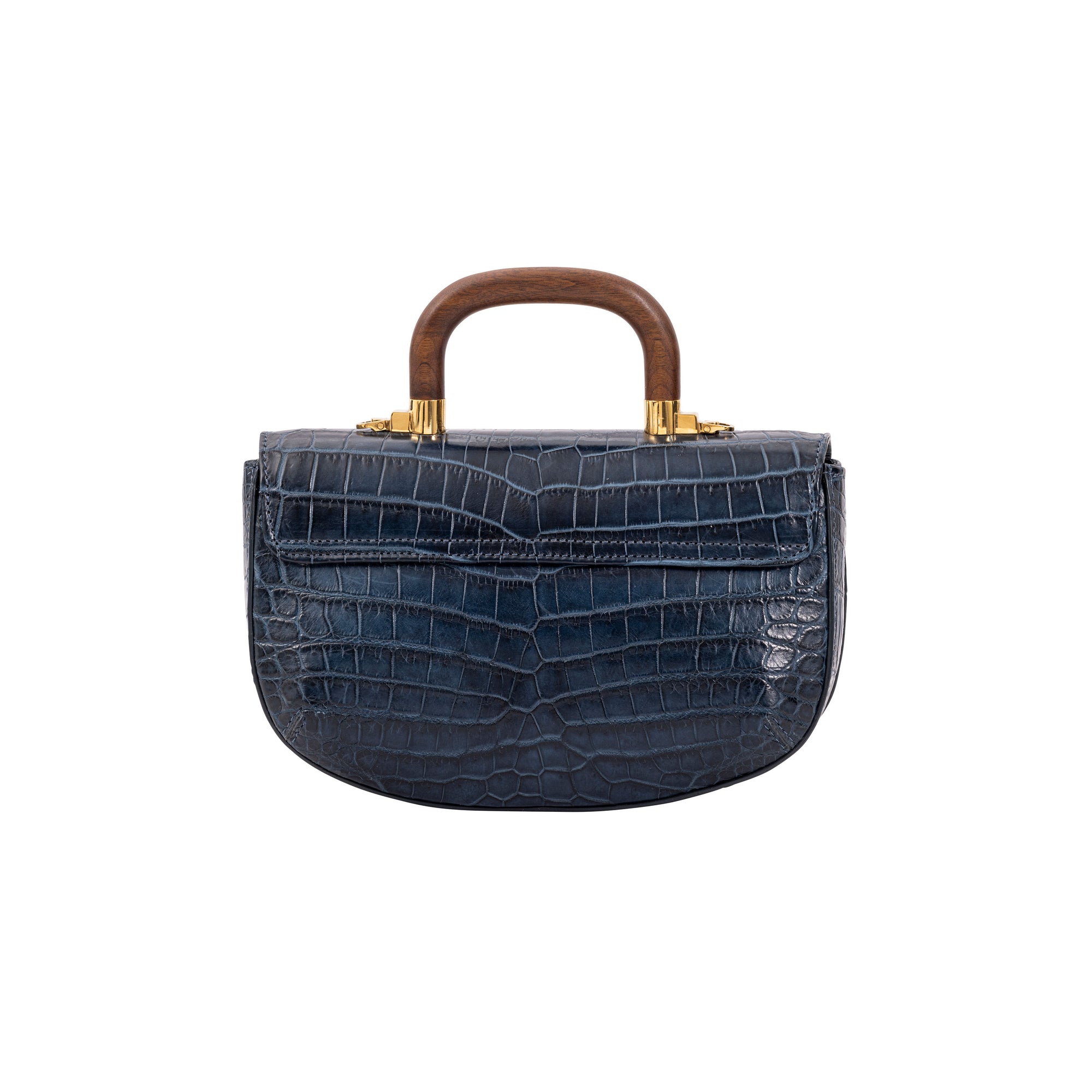 Back of a navy crocodile handbag with a wooden handle on a white background