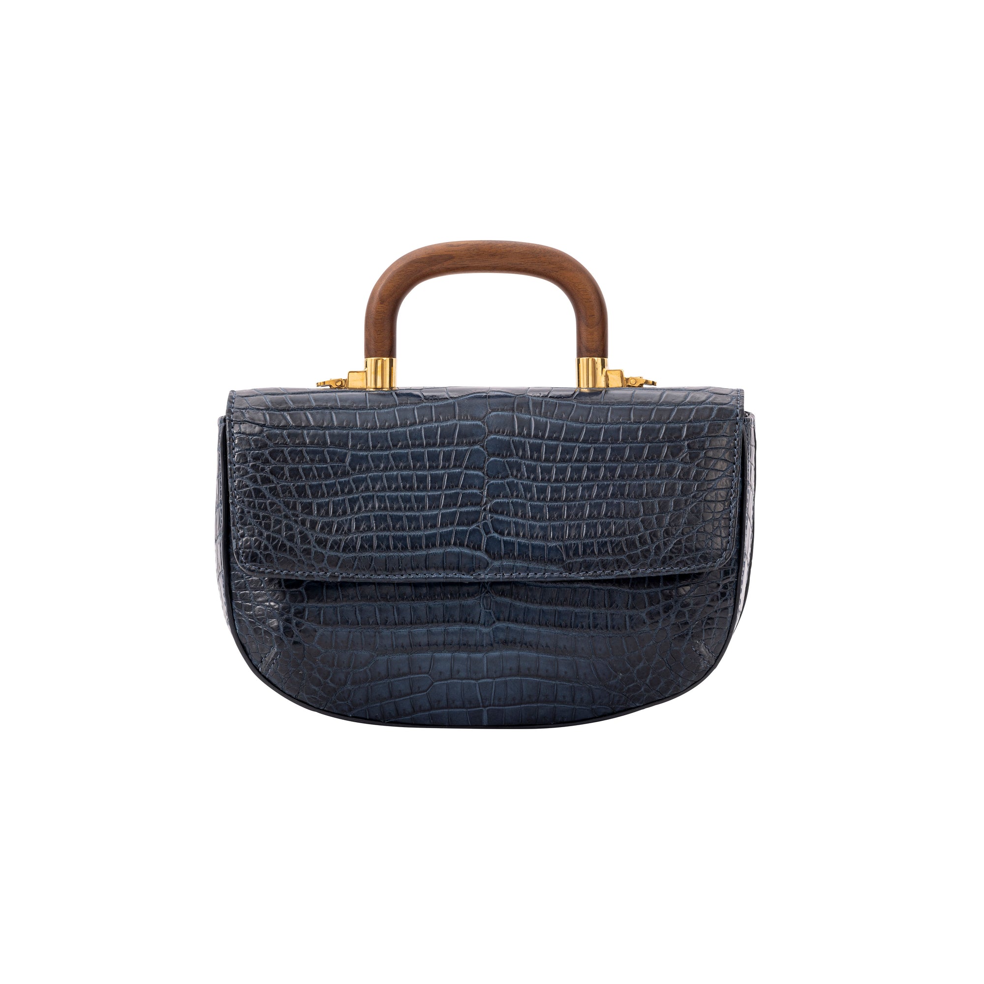 Front of a navy crocodile handbag with a wooden handle on a white background