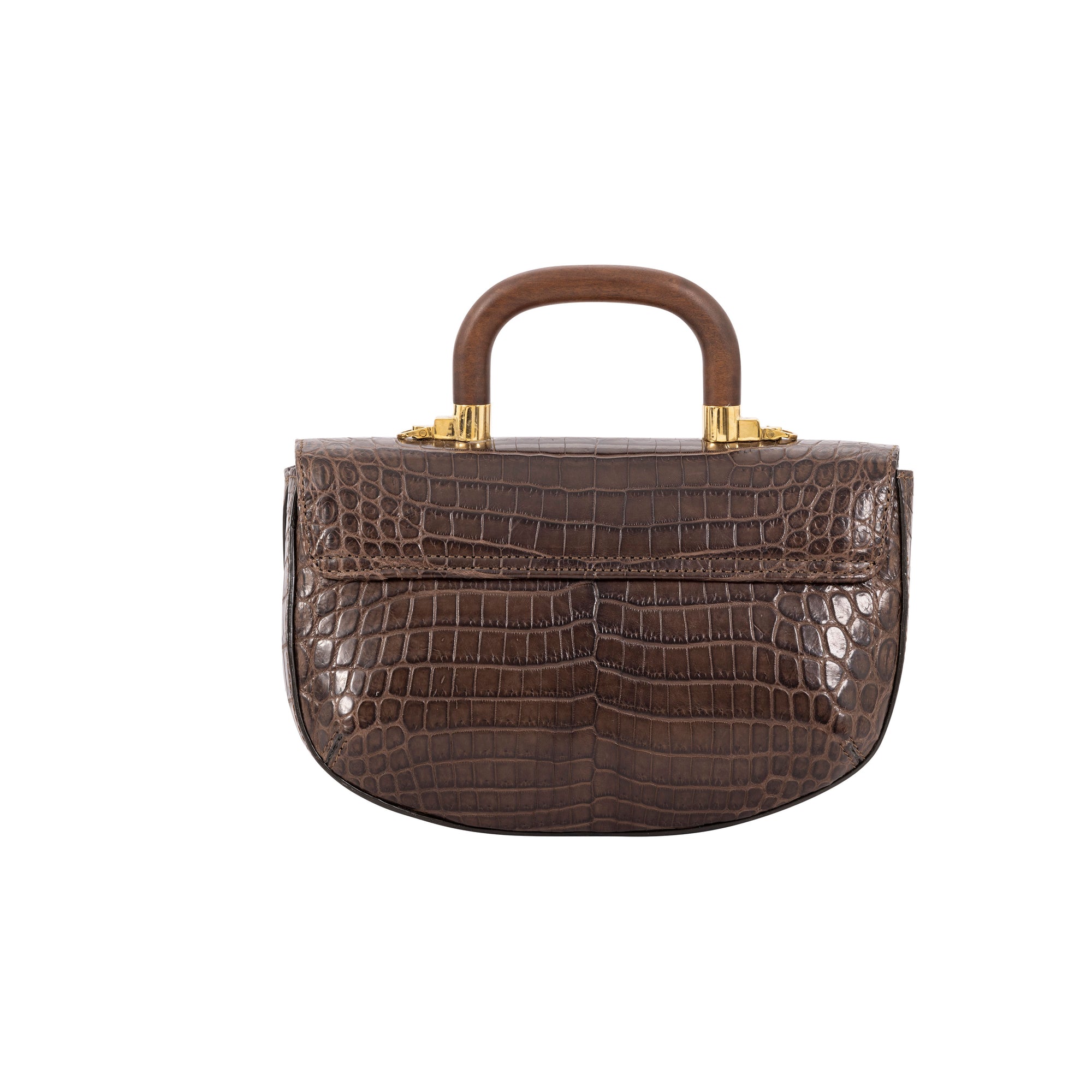 Back of a brown textured handbag with a wooden handle on a white background