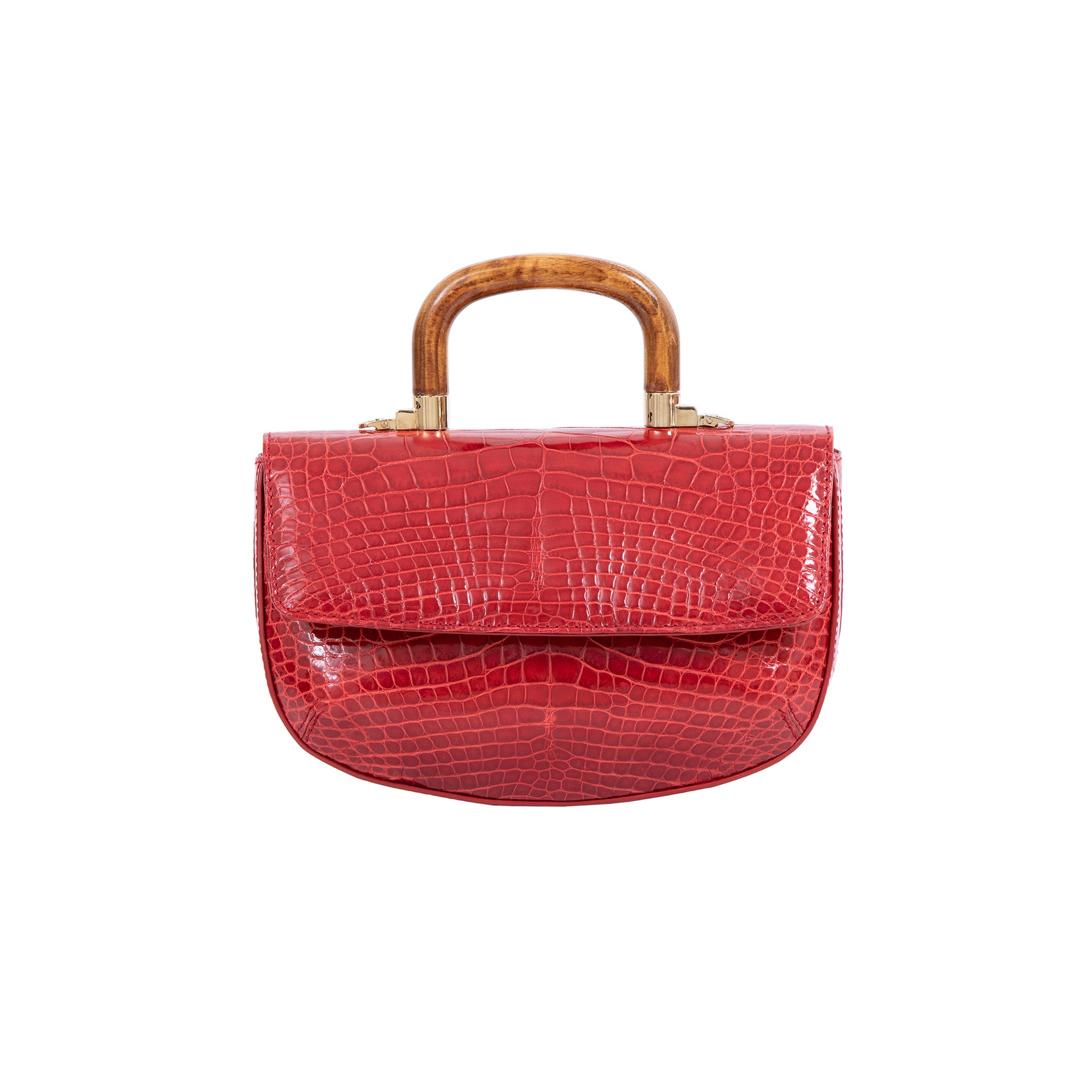 Front of a red crocodile-patterned handbag with a wooden handle on a white background