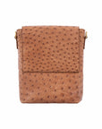 Cognac ostrich messenger bag on a white background