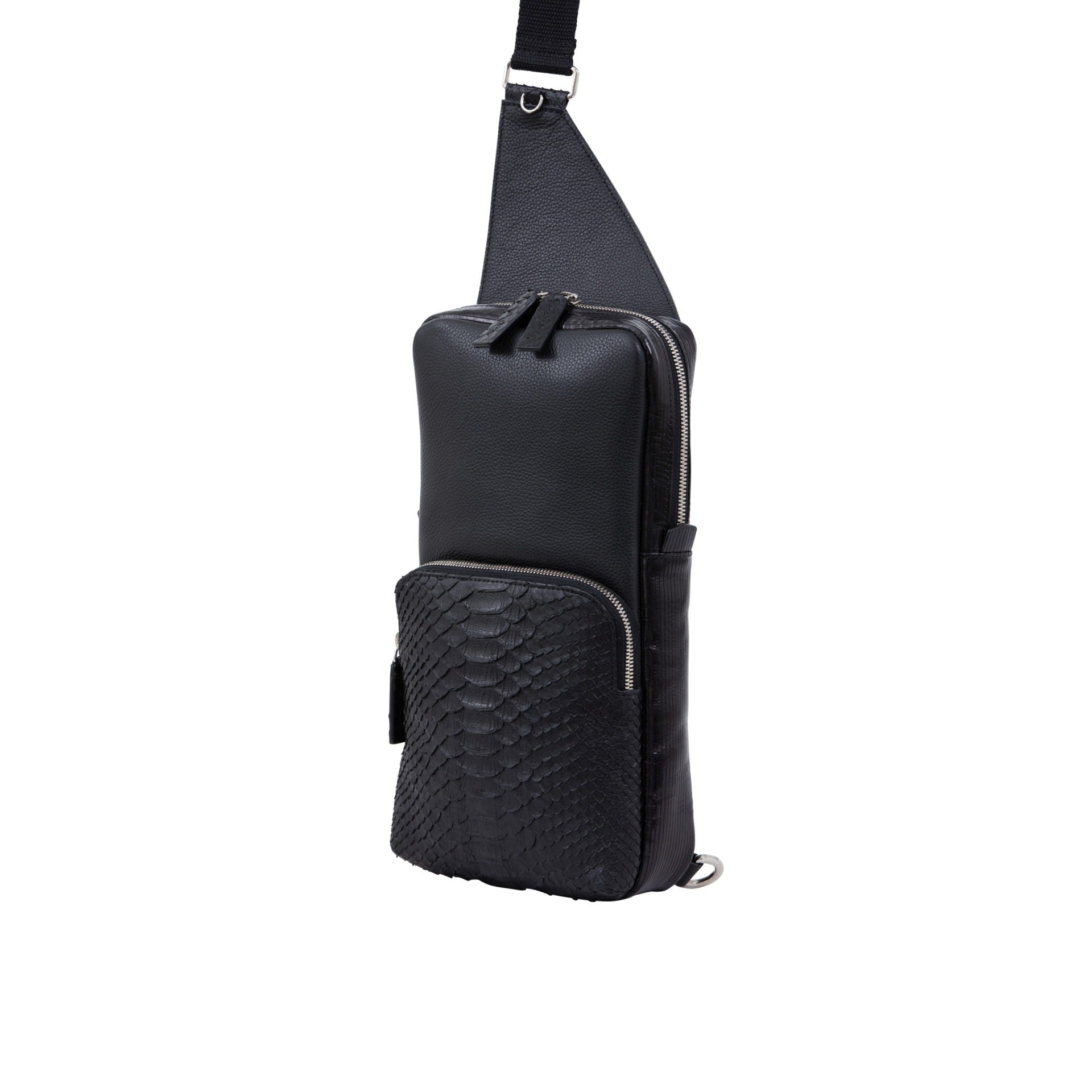 Side of a black python textured chest bag on a white background