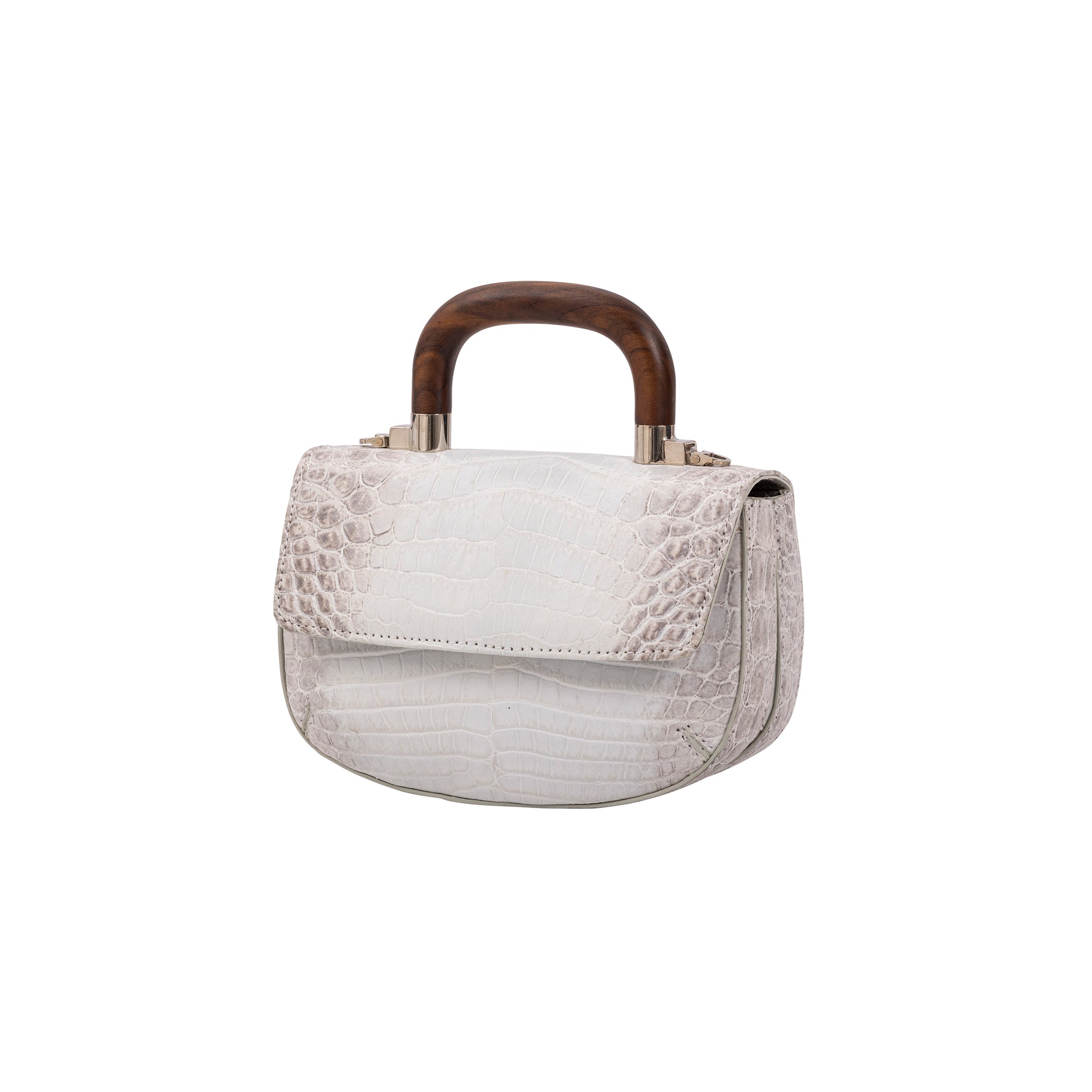 White crocodile-textured handbag with wooden handle on a white background