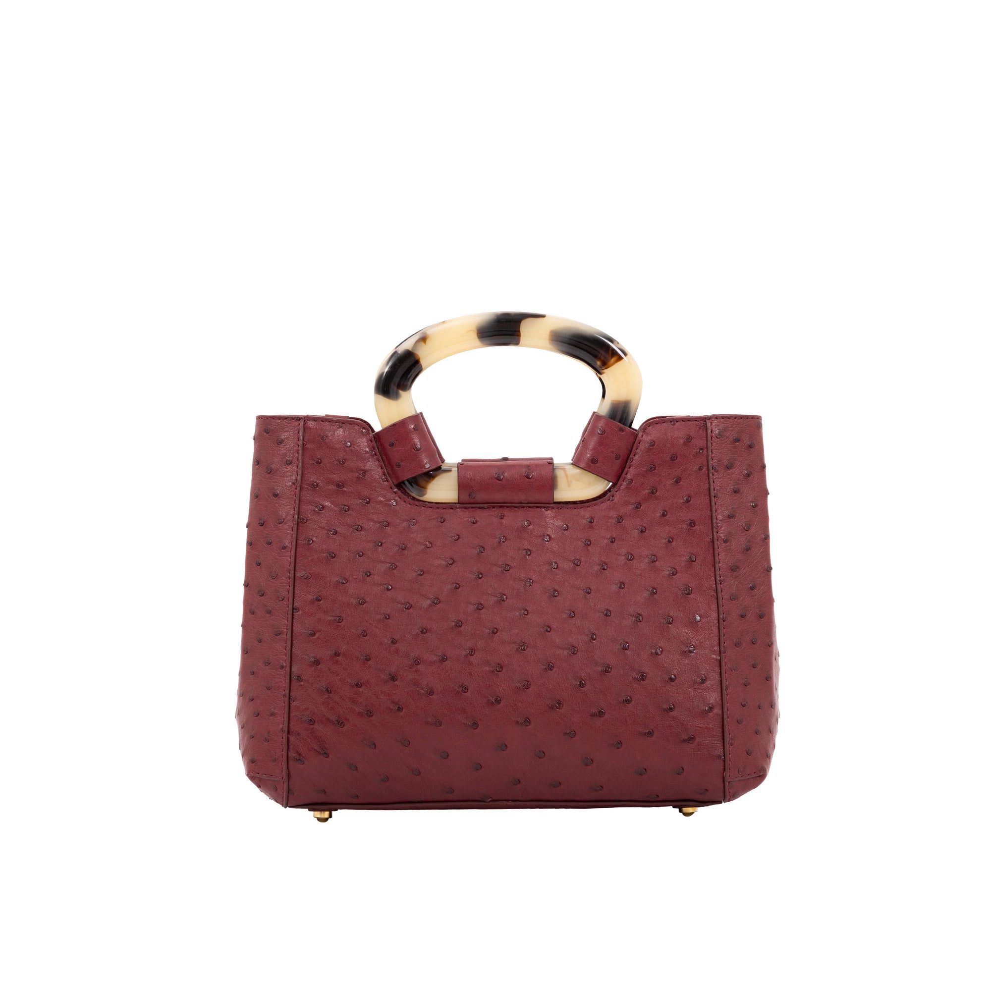 Front of maroon ostrich handbag with a handle on a white background