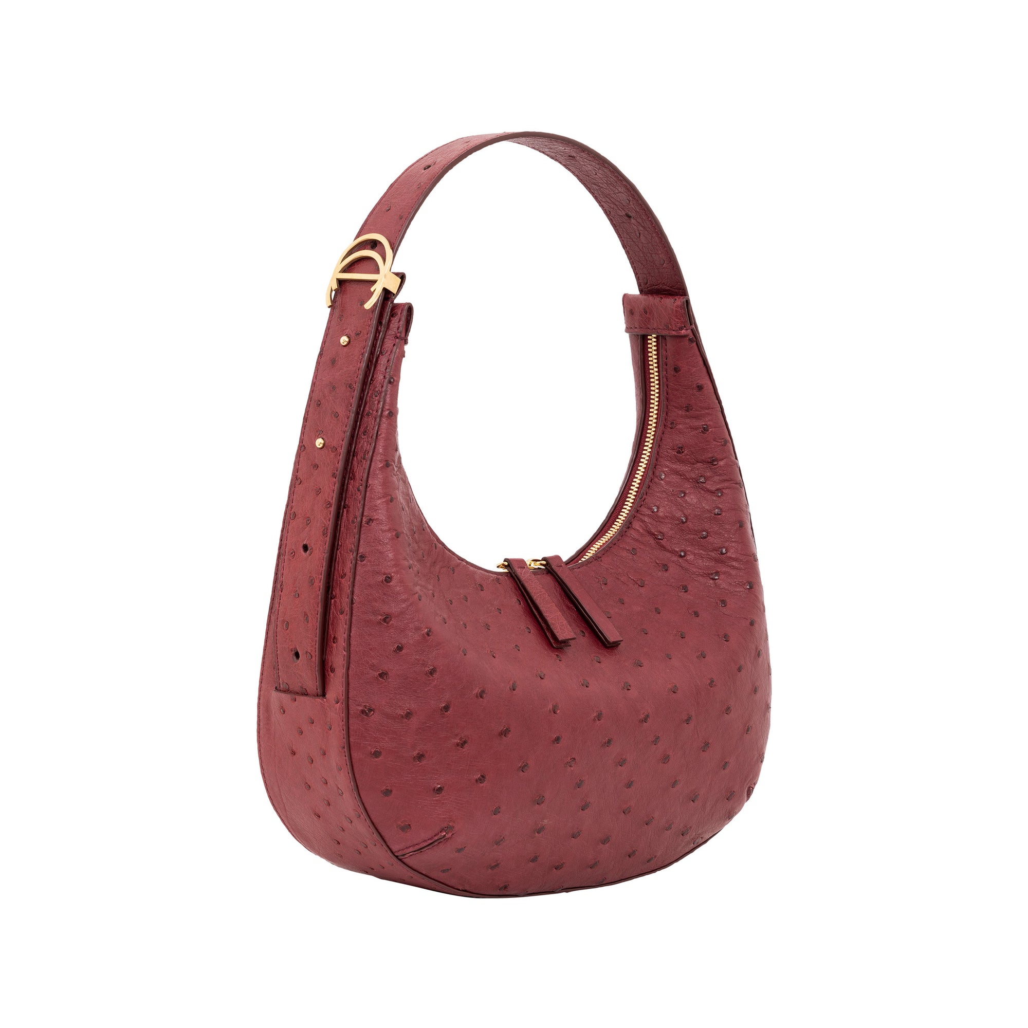 Red ostrich-textured handbag with a gold buckle on a white background
