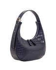 Navy crocodile-patterned handbag on a white background