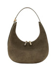 Brown suede handbag with a strap on a white background