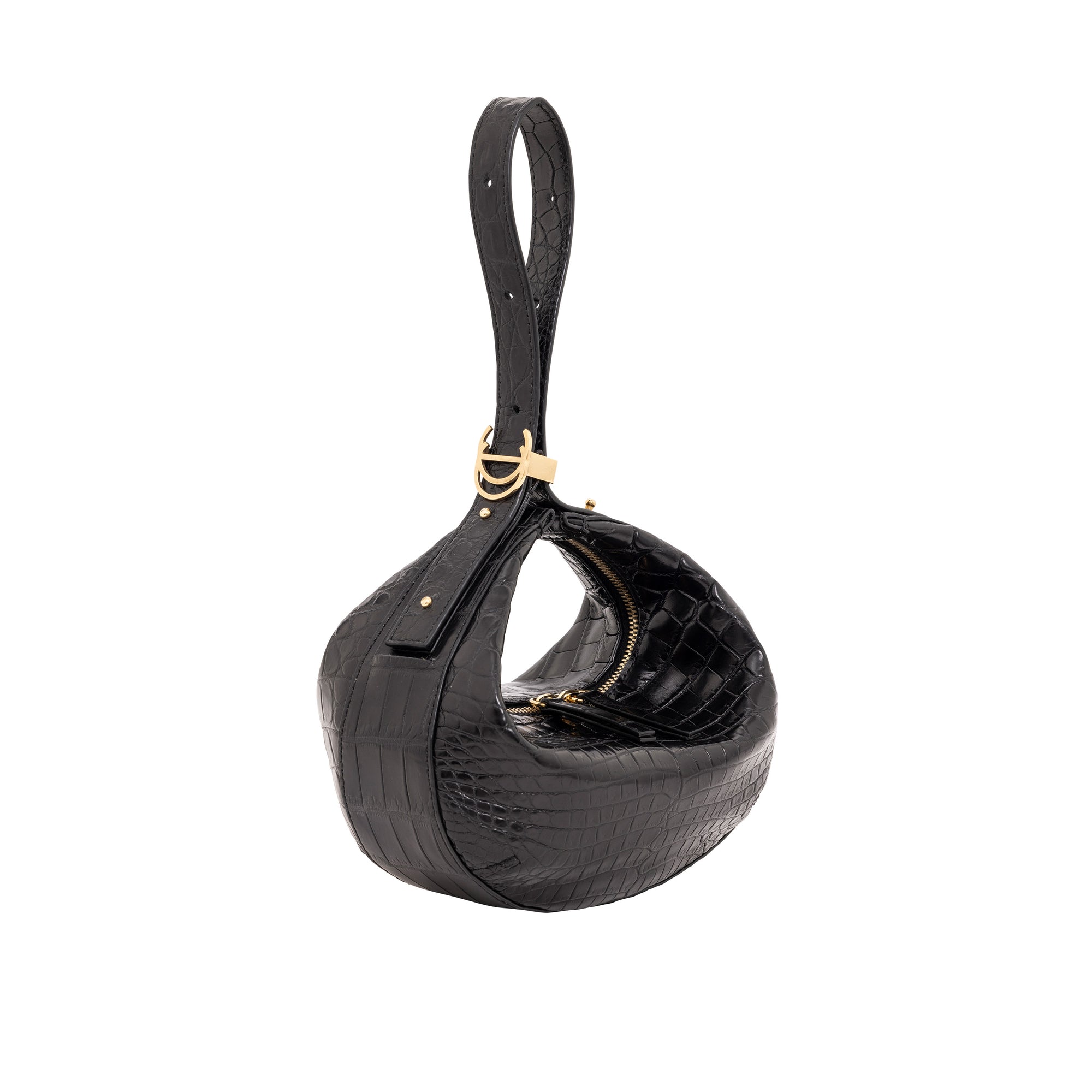Black crocodile-patterned handbag on a white background