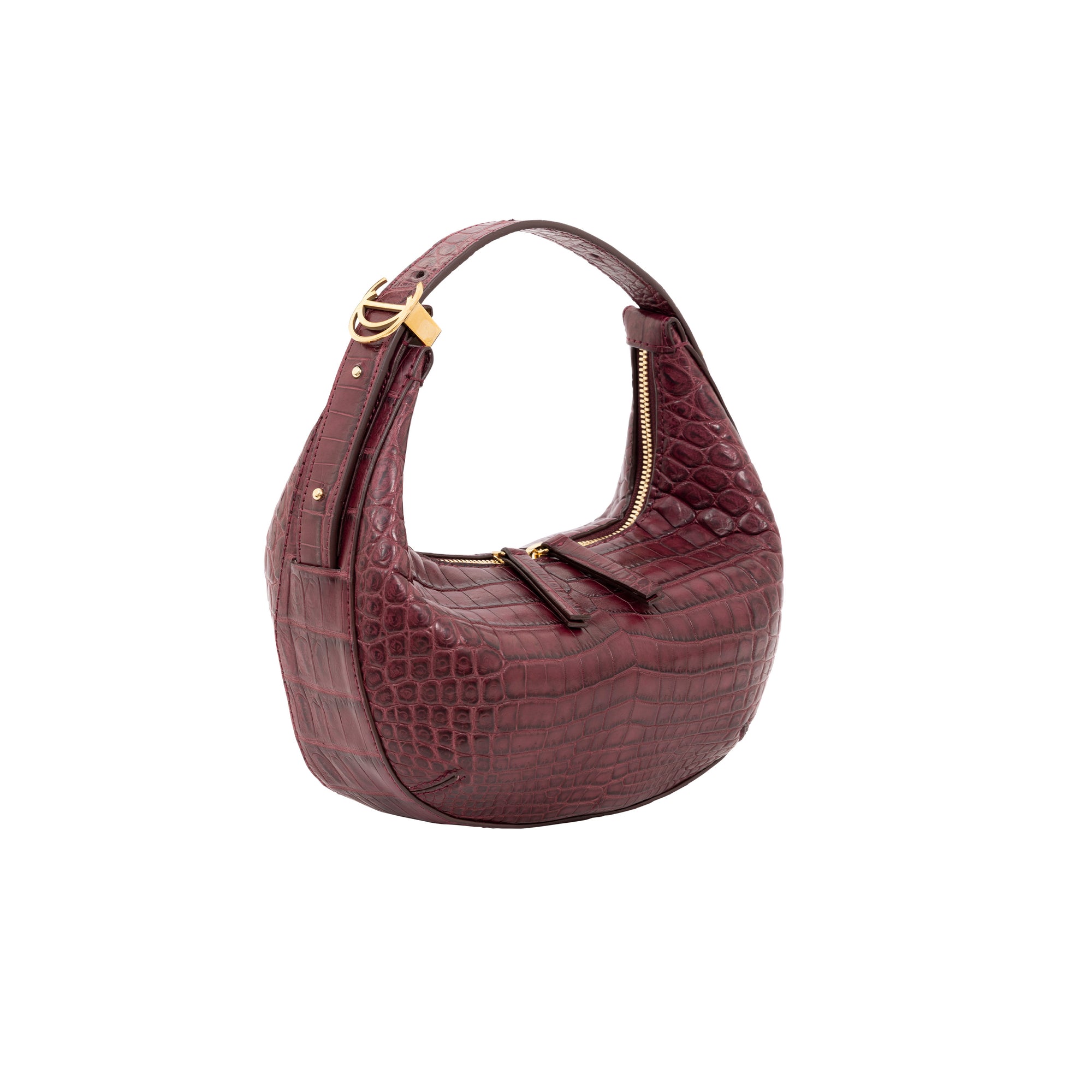 Maroon crocodile-patterned handbag with gold accents on a white background