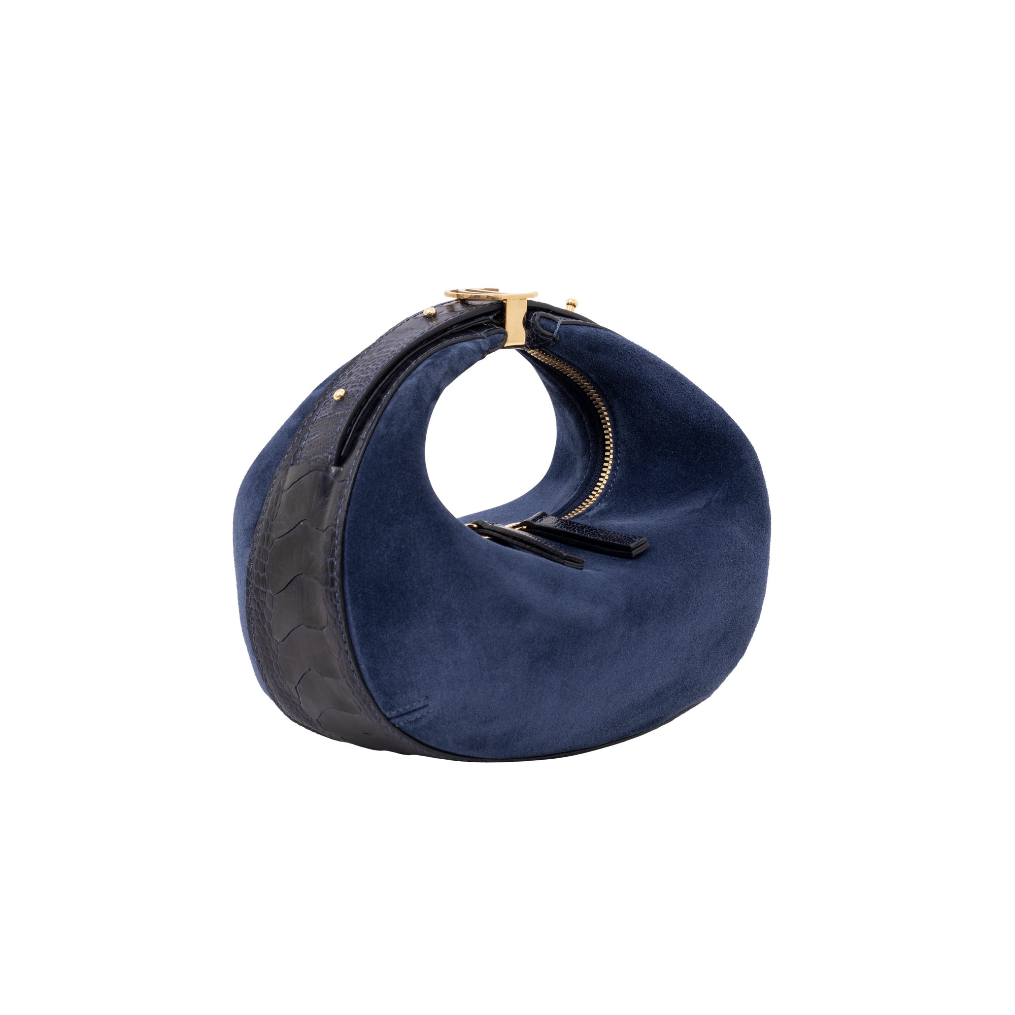 Blue suede handbag with gold accents on a white background