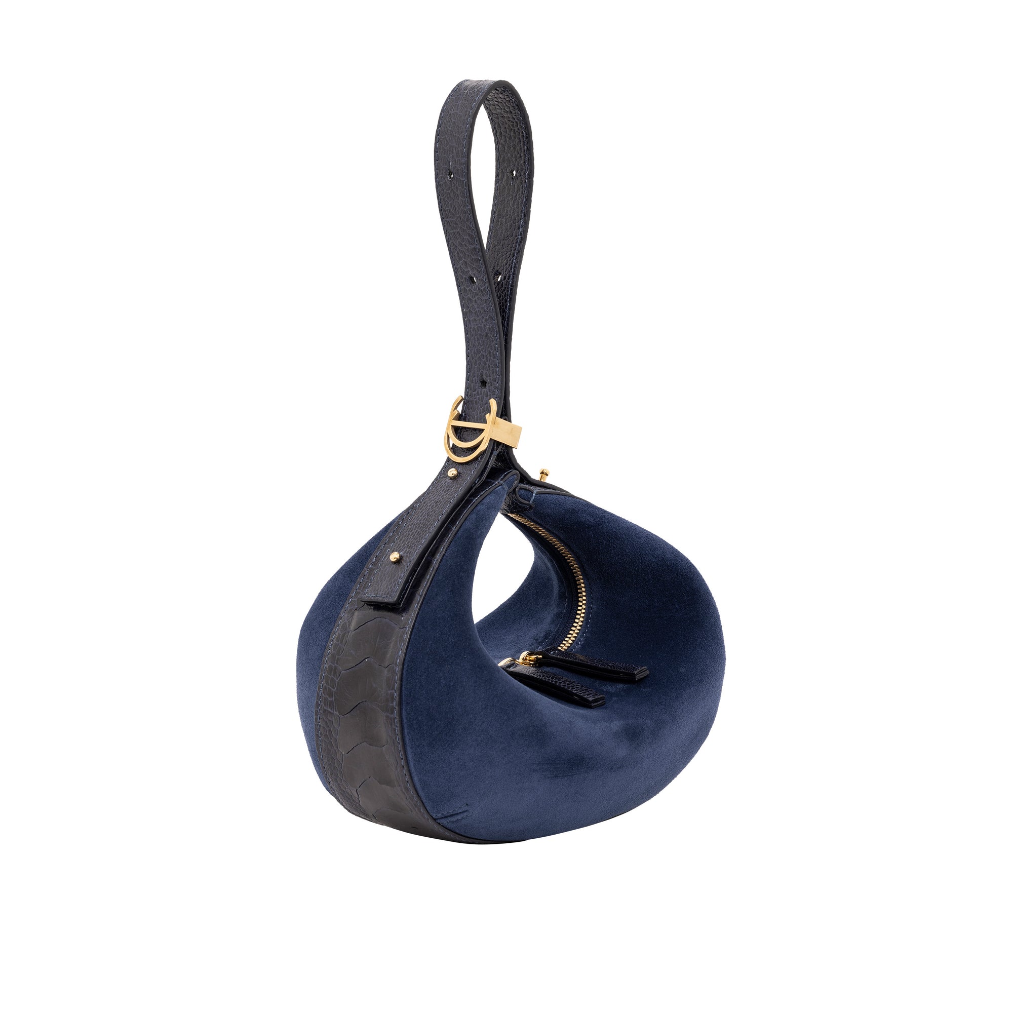 Blue suede handbag with gold accents on a white background