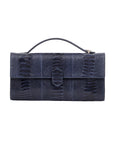 Front side of navy ostrich textured handbag on a white background