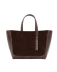 Dark brown semi suede-textured handbag on a white background