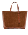 Cognac semi suede-textured handbag on a white background