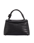 The Esme in Black is crafted from premium crocodile leather, balancing a relaxed silhouette with refined craftsmanship. A distinctive rope handle and detachable strap offer versatile styling, while thoughtful details bring effortless functionality to everyday luxury.