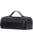 Black crocodile textured watch box on a white background 