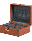 Brown ostrich jewelry box with compartments on a white background