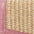 Close-up of a textured pink and beige surface