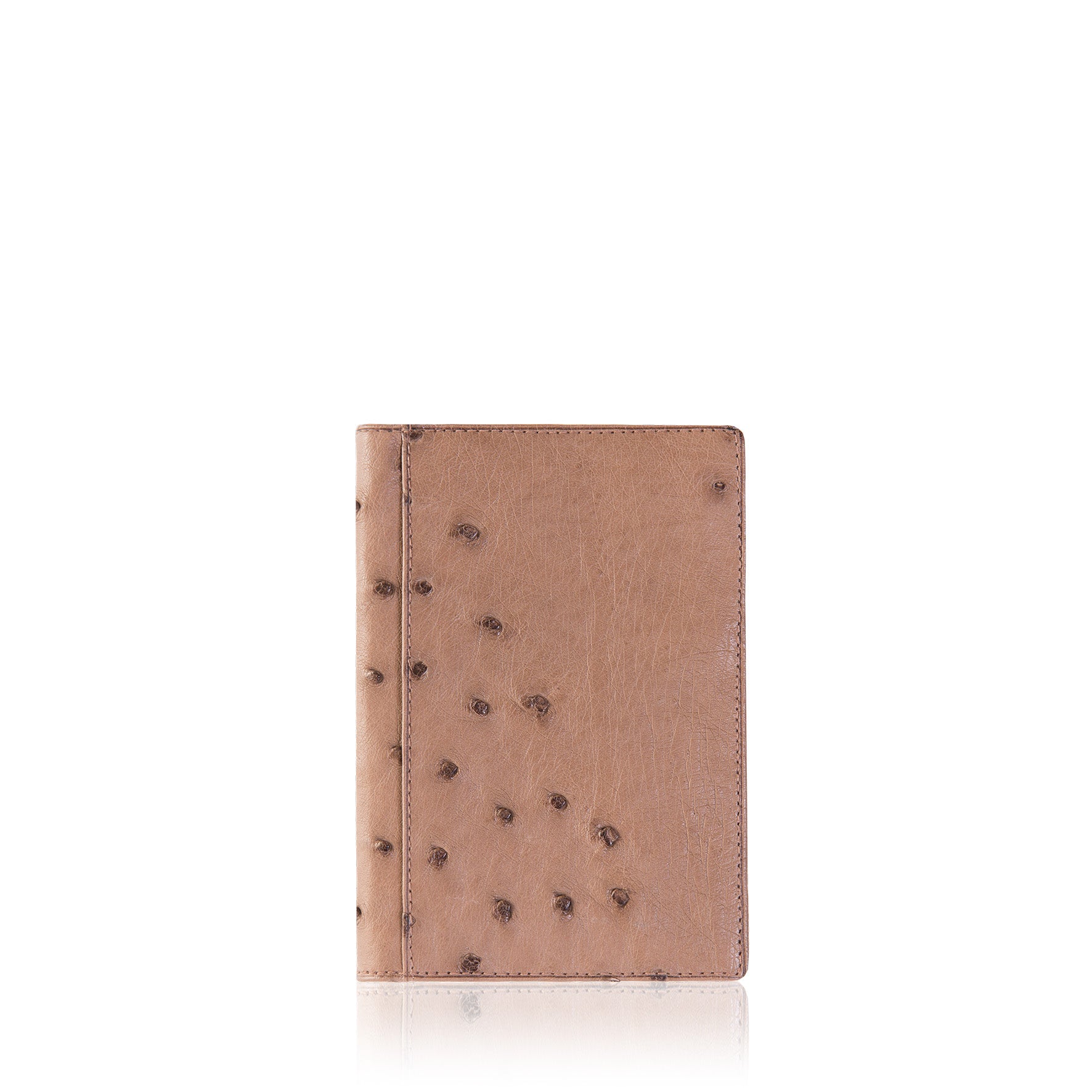Brown leather wallet with black speckles on a white background
