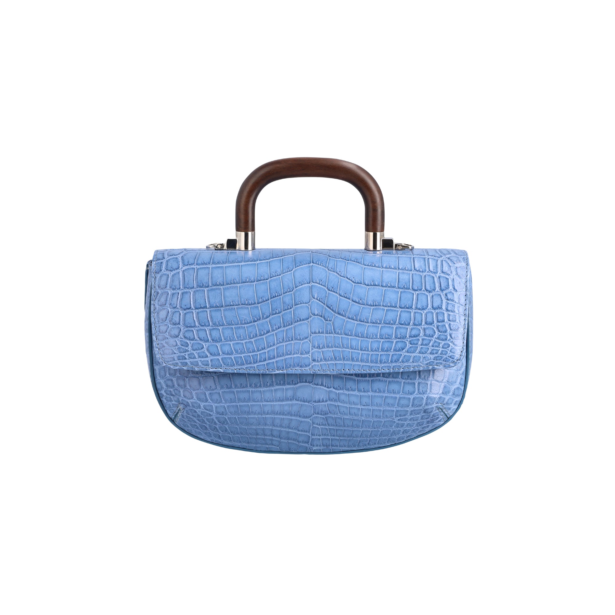 Front of a blue crocodile handbag with a wooden handle on a white background