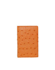 Orange leather wallet with a textured pattern on a white background