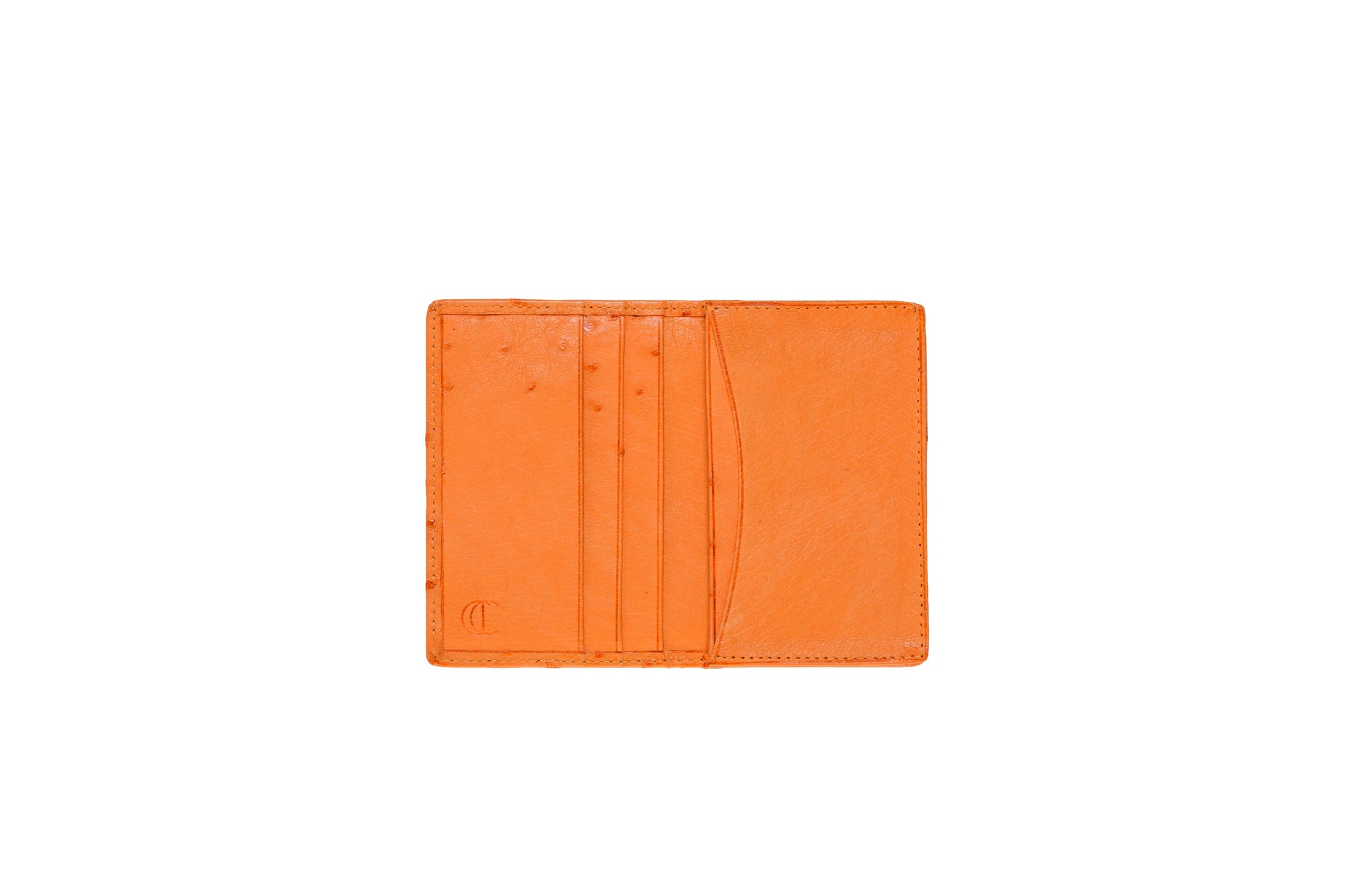 Open orange leather wallet on a white background