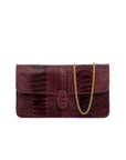 Burgundy textured clutch bag on a white background