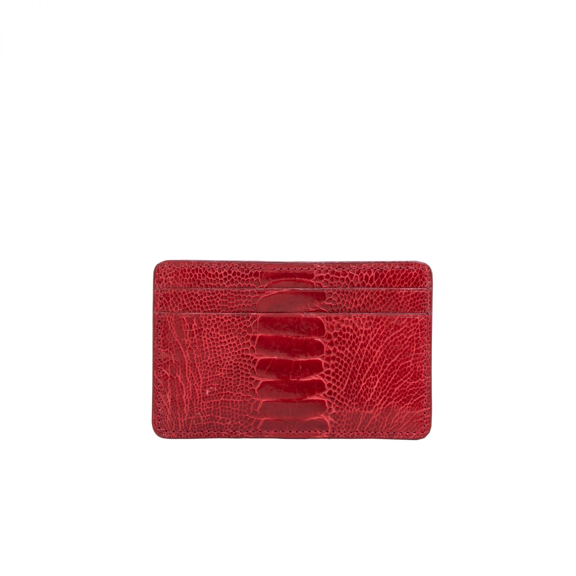 Back of a red ostrich leg textured cardholder on a white background