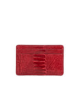 Back of a red ostrich leg textured cardholder on a white background