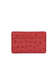 Front of a red ostrich textured cardholder on a white background