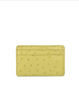 Yellow textured cardholder on a white background