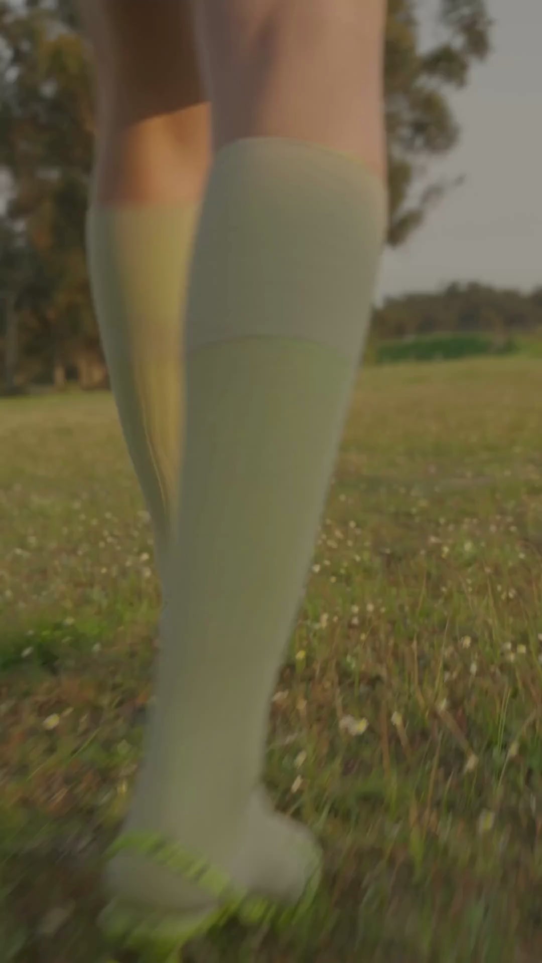 Women walking with a brown leather handbag